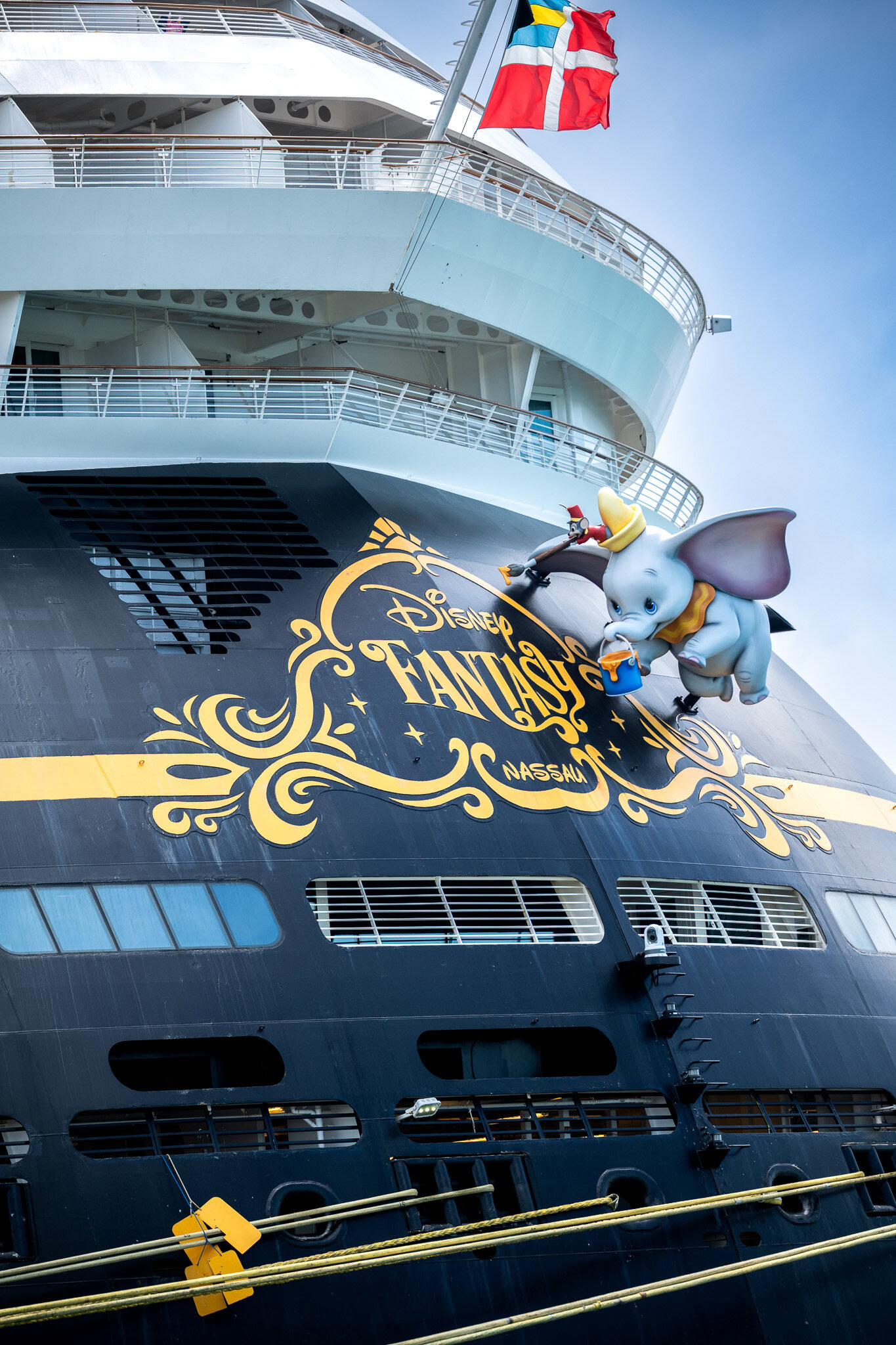 Disney Fantasy Stern with Dumbo and Timothy Mouse – Nassau Port Stern of the Disney Fantasy cruise ship with Dumbo and Timothy Mouse statue above the ship's name and Nassau registration.