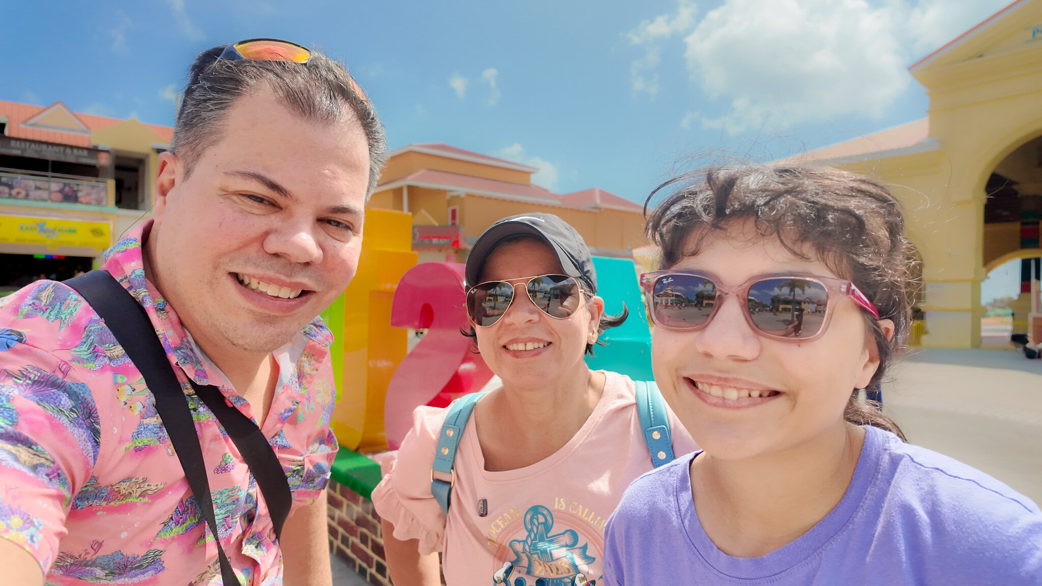 Family selfie of Raúl, Lucy, and Daniela in St. Kitts during a Disney Magic Southern Caribbean cruise day.