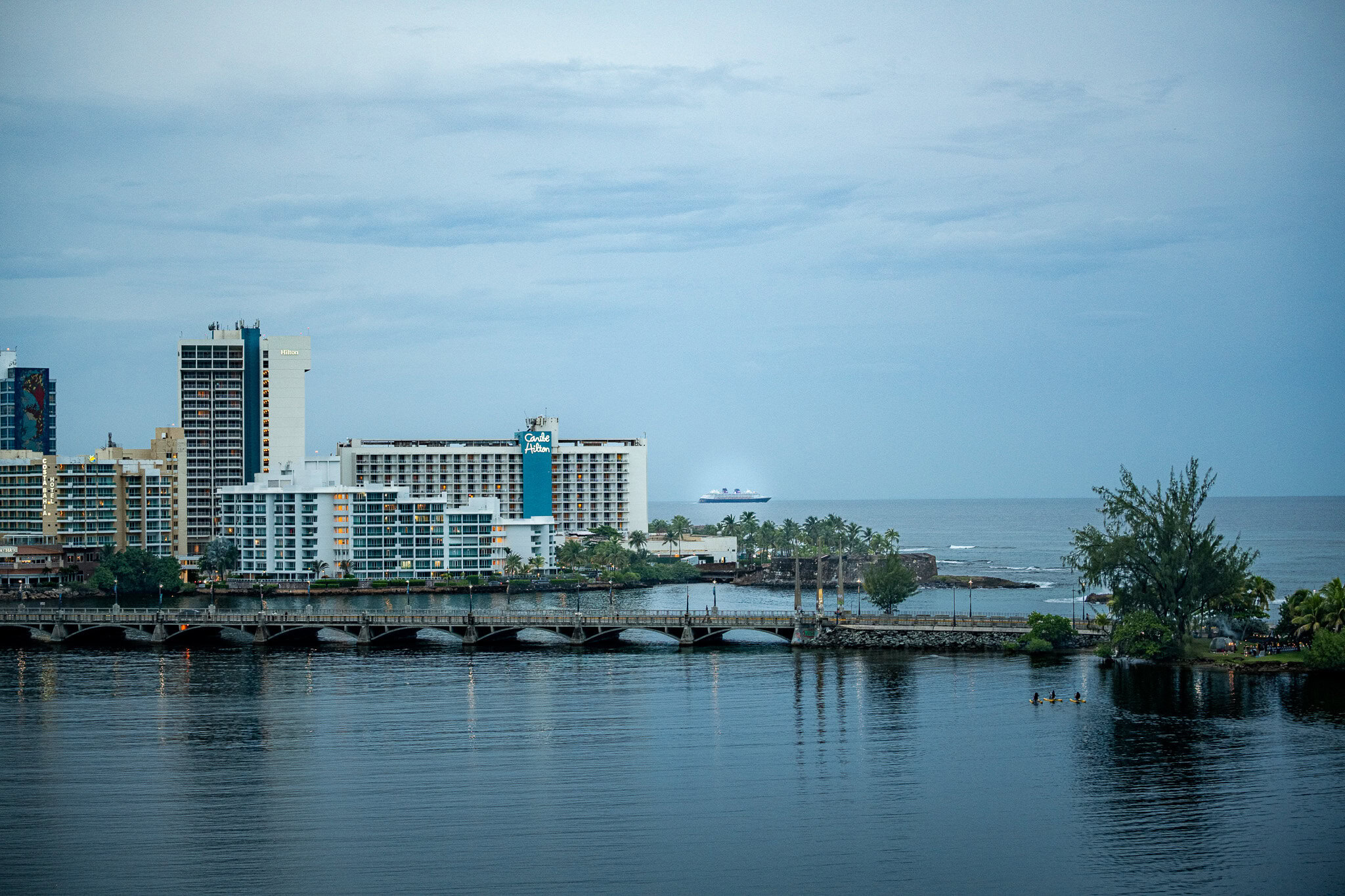 Disney Magic cruise ship sailing near Caribe Hilton in San Juan Puerto Rico