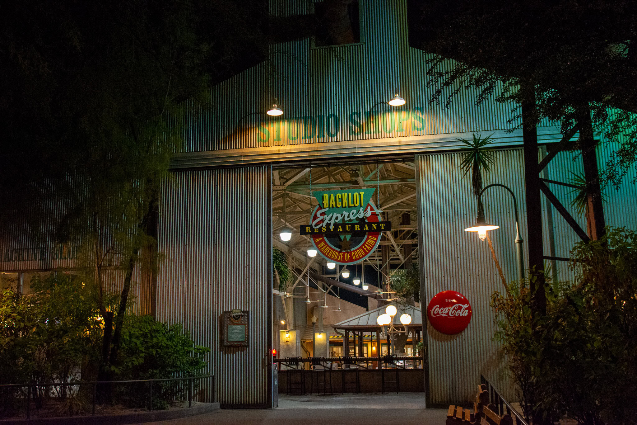 Backlot Express quick-service restaurant at Disney's Hollywood Studios at night.