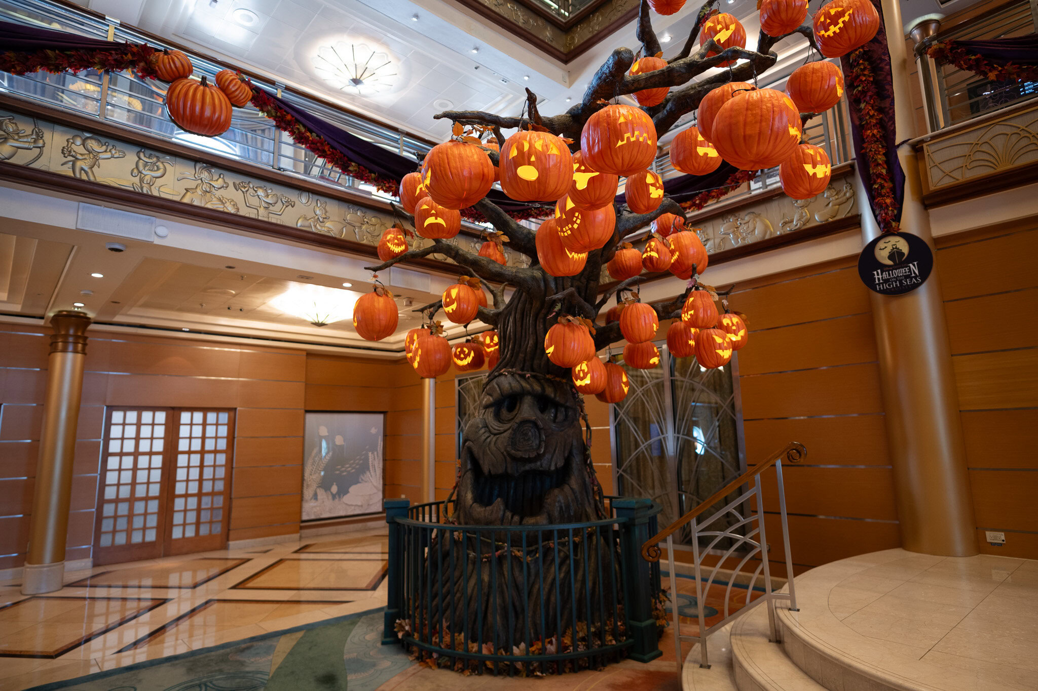 Halloween on the High Seas pumpkin tree in the Disney Magic atrium
