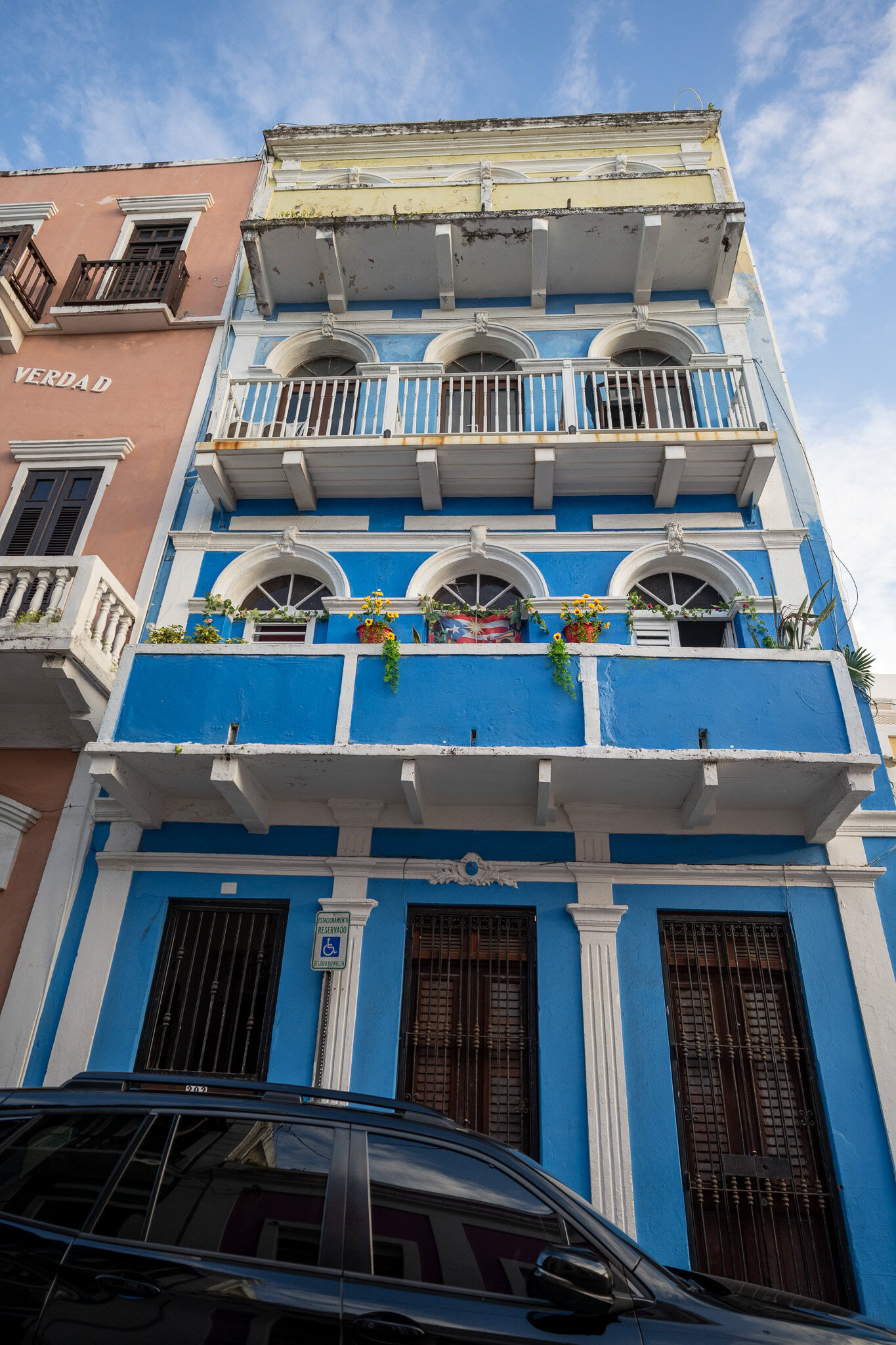 Historic blue colonial building with balconies in Old San Juan Puerto Rico