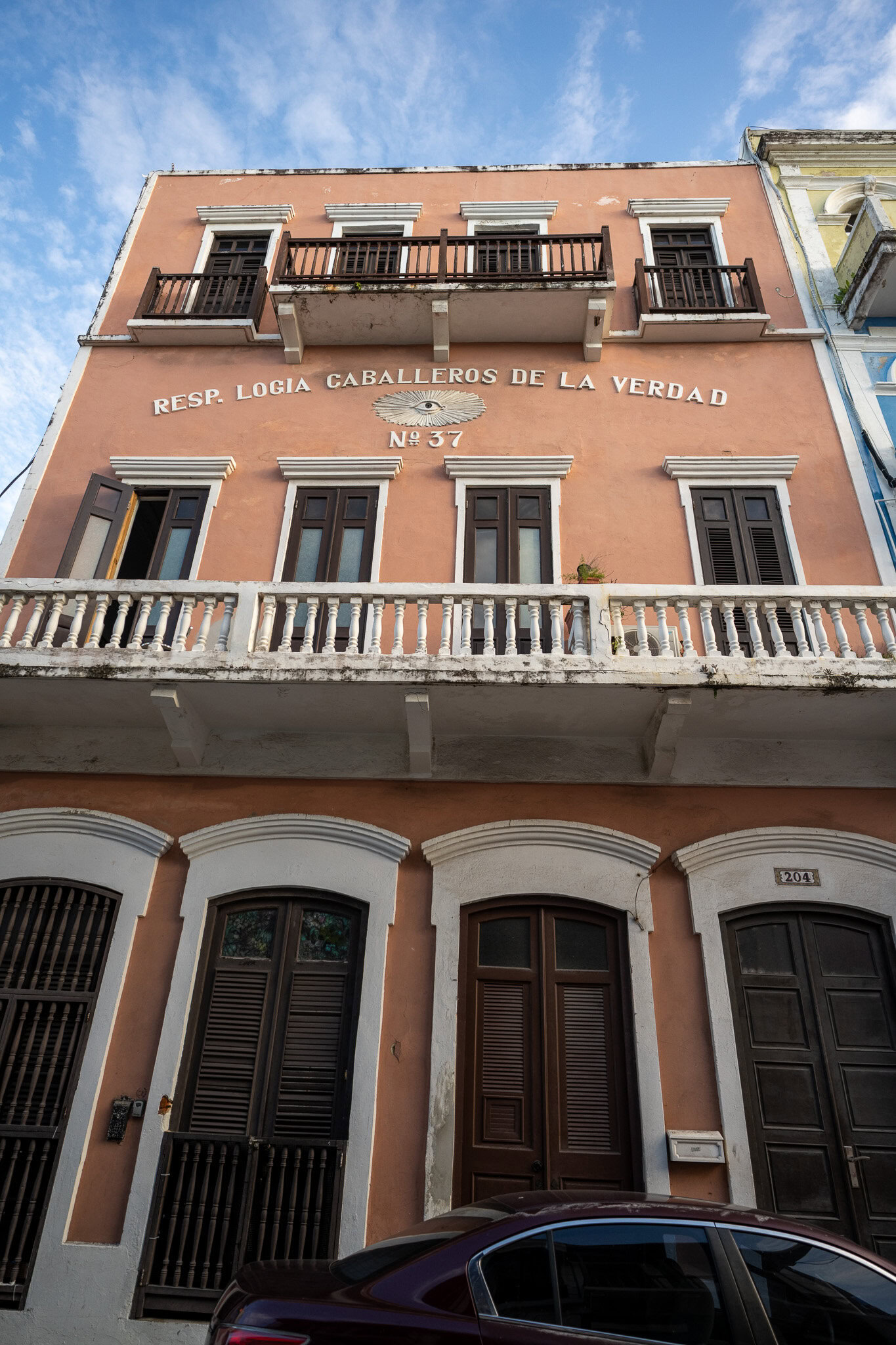 Historic Masonic building in Old San Juan with colonial architecture and symbolic details