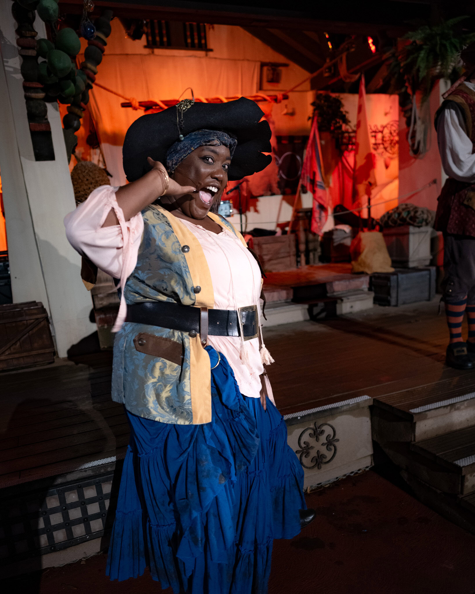 Faith Boles performing as a pirate in Adventureland during MNSSHP