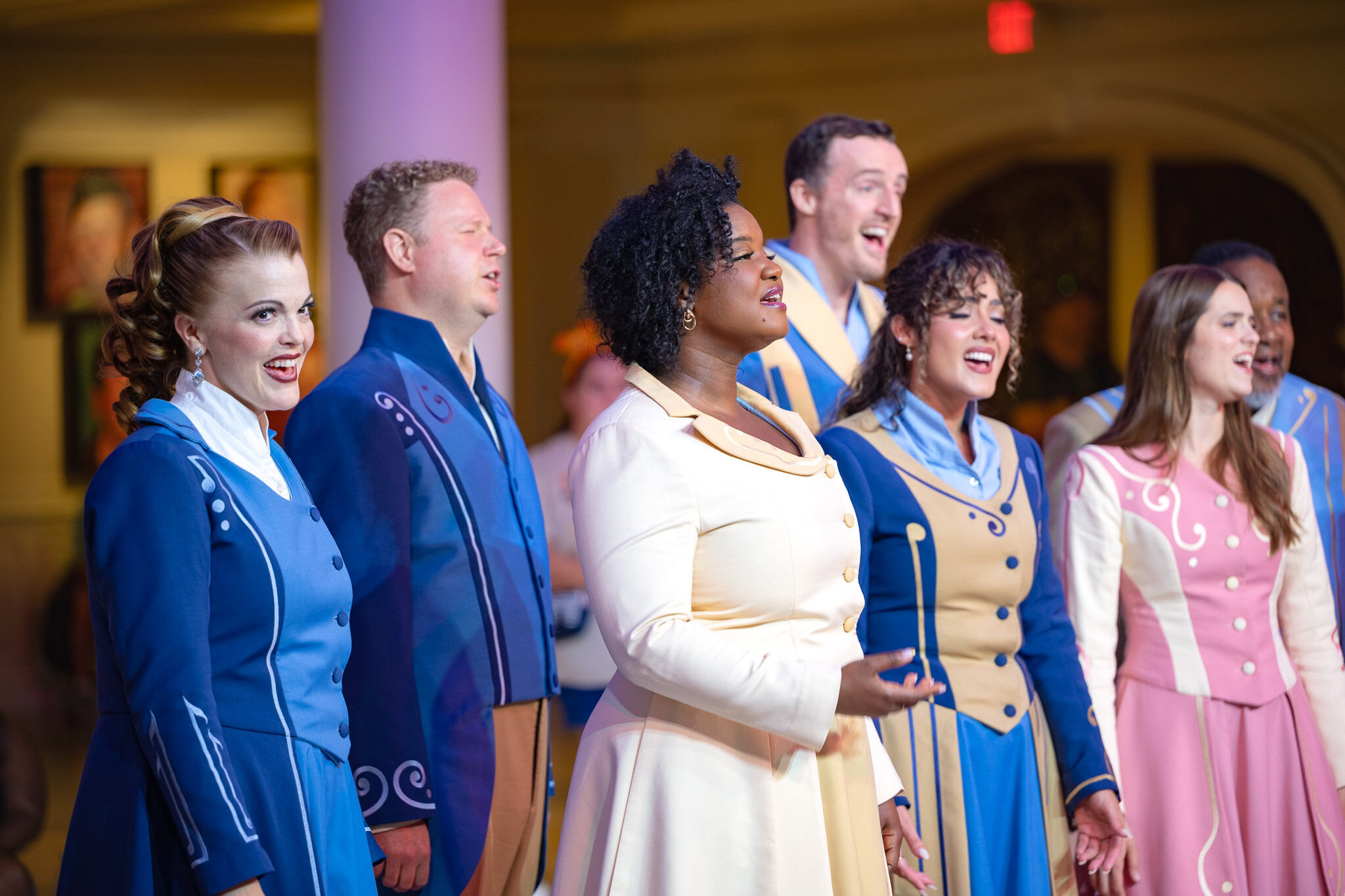 Voices of Liberty singers performing at EPCOT’s American Adventure, featuring Kelly Morris Rowan