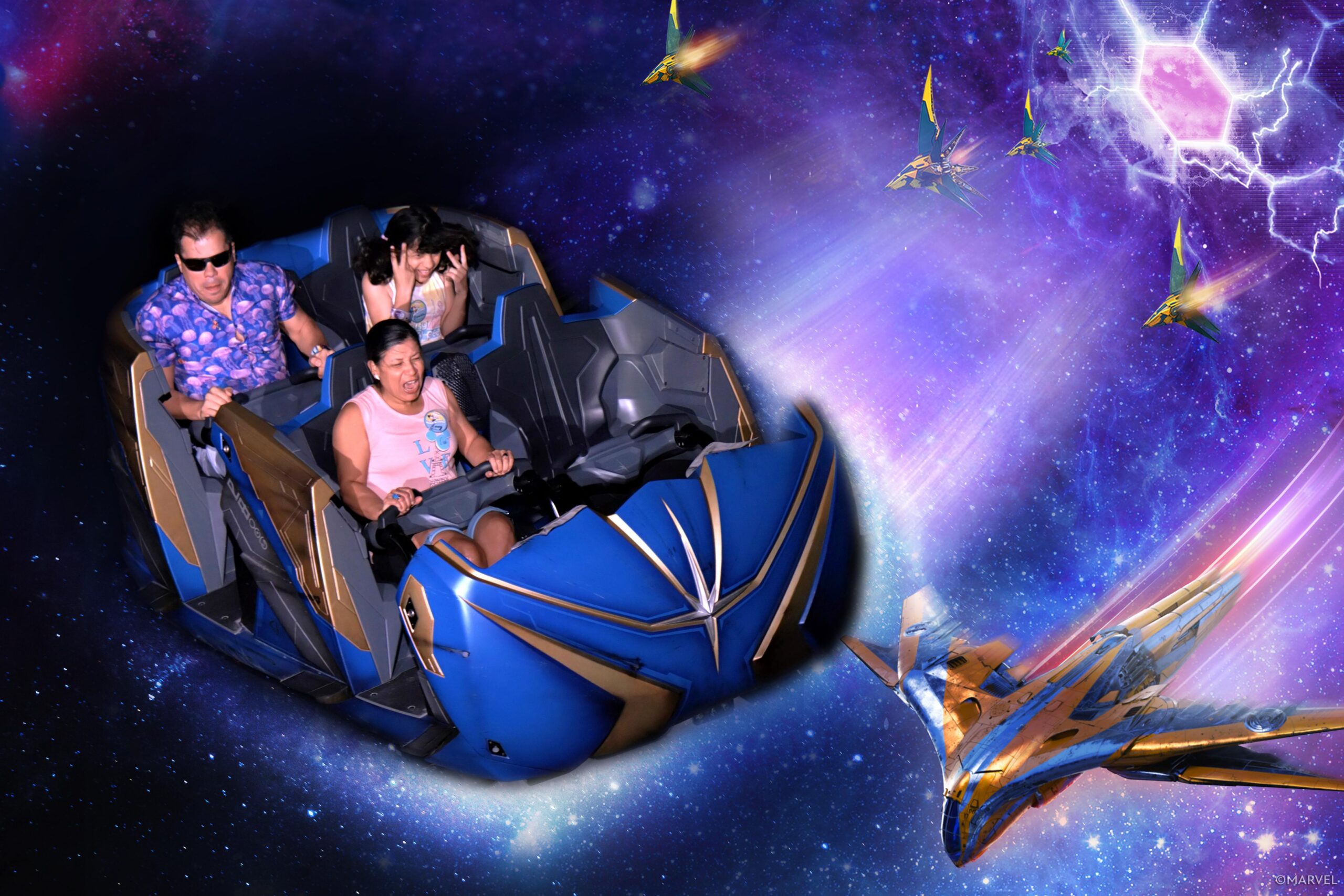 Family riding Guardians of the Galaxy Cosmic Rewind roller coaster at EPCOT