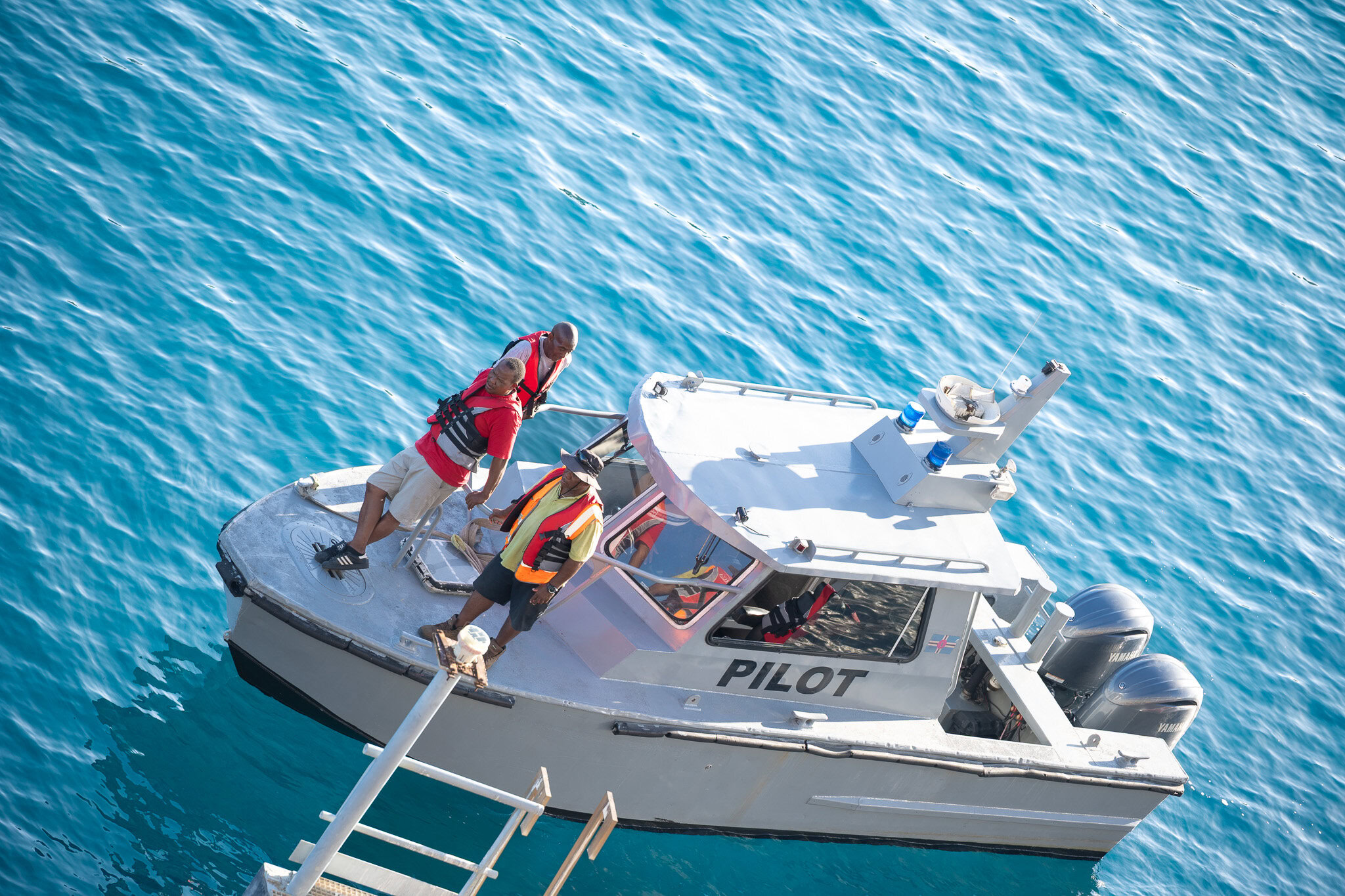 Pilot boat next to cruise ship in Dominica waters