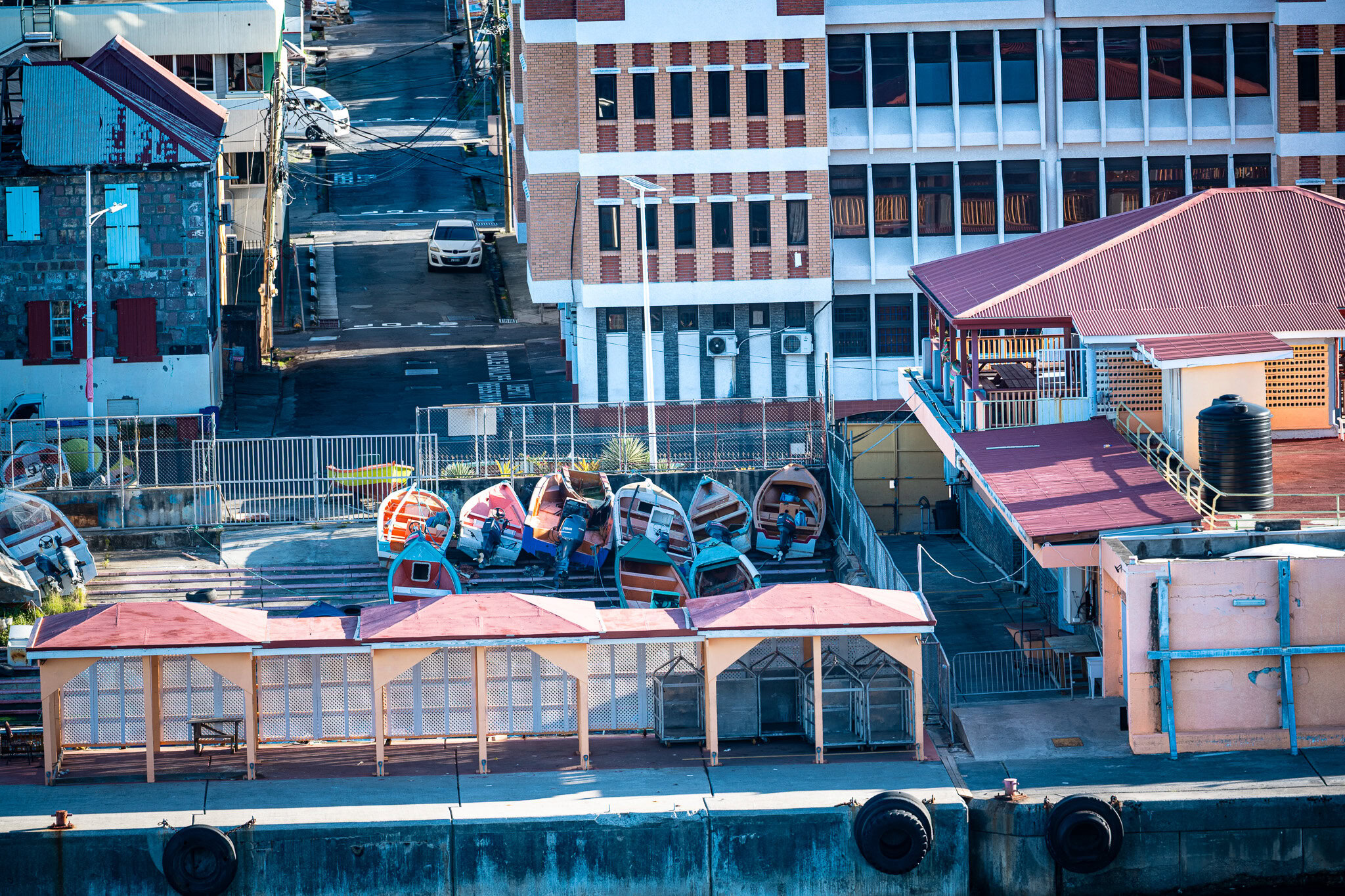 Small boats parked near the Dominica cruise port dock