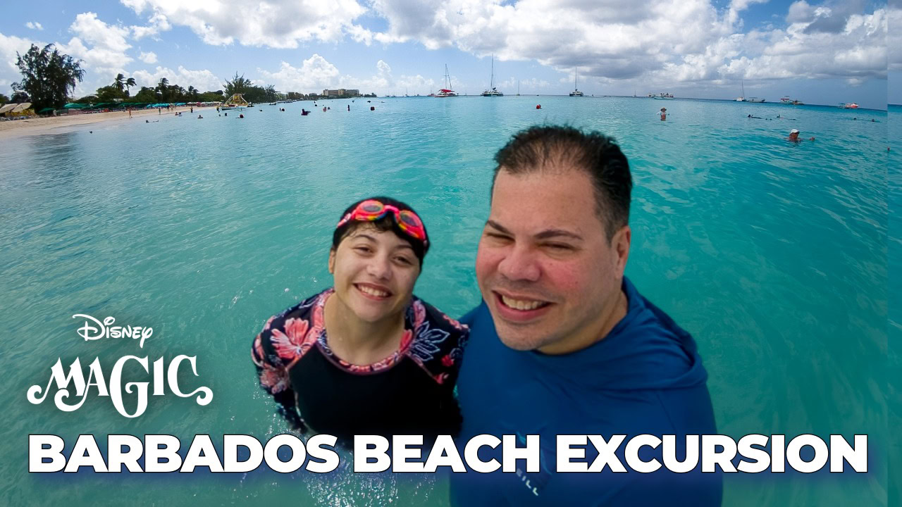 Disney Magic cruise passengers enjoying turquoise water during a Barbados beach excursion at Carlisle Bay.