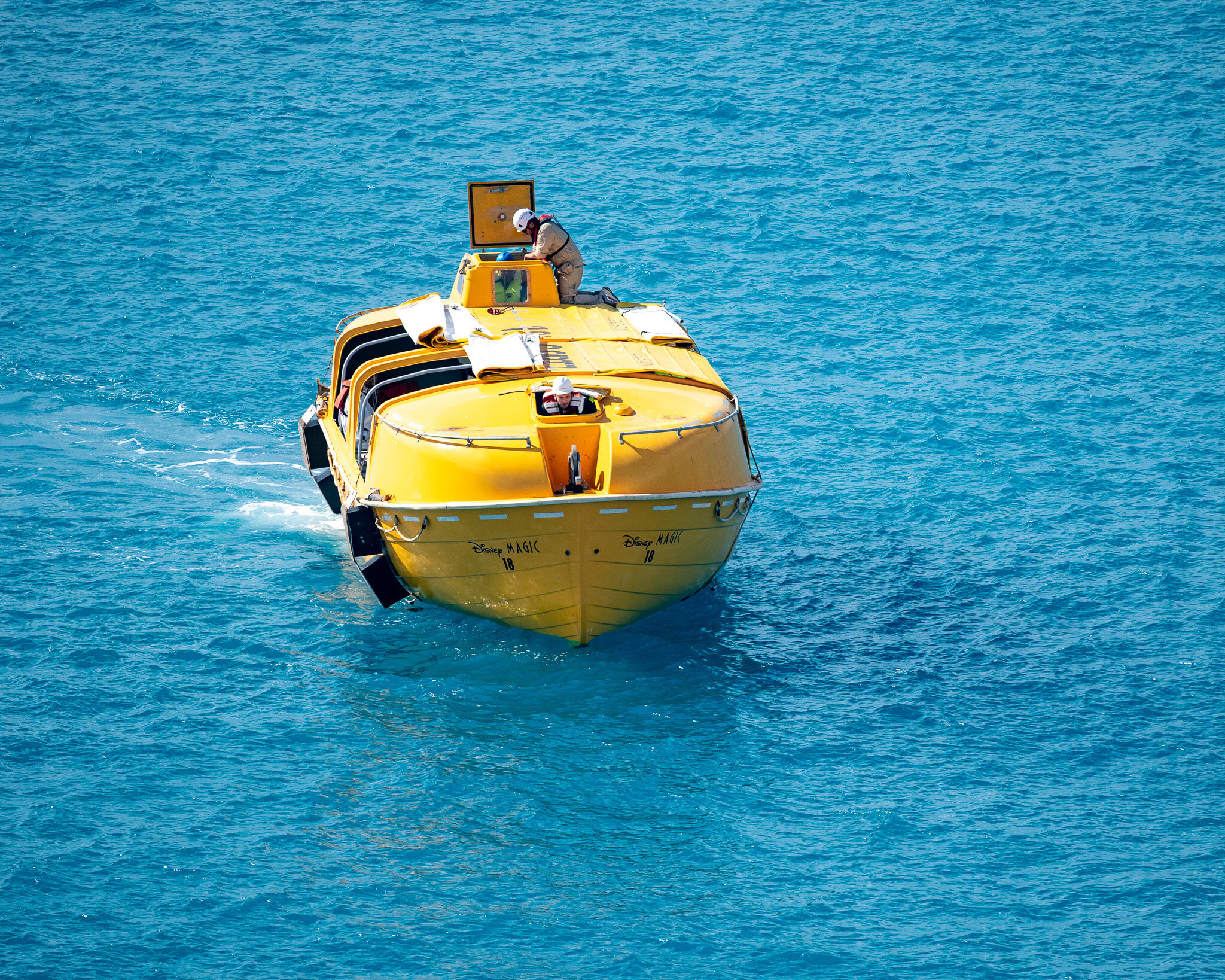 Disney Magic lifeboat returning during crew safety training in Barbados.