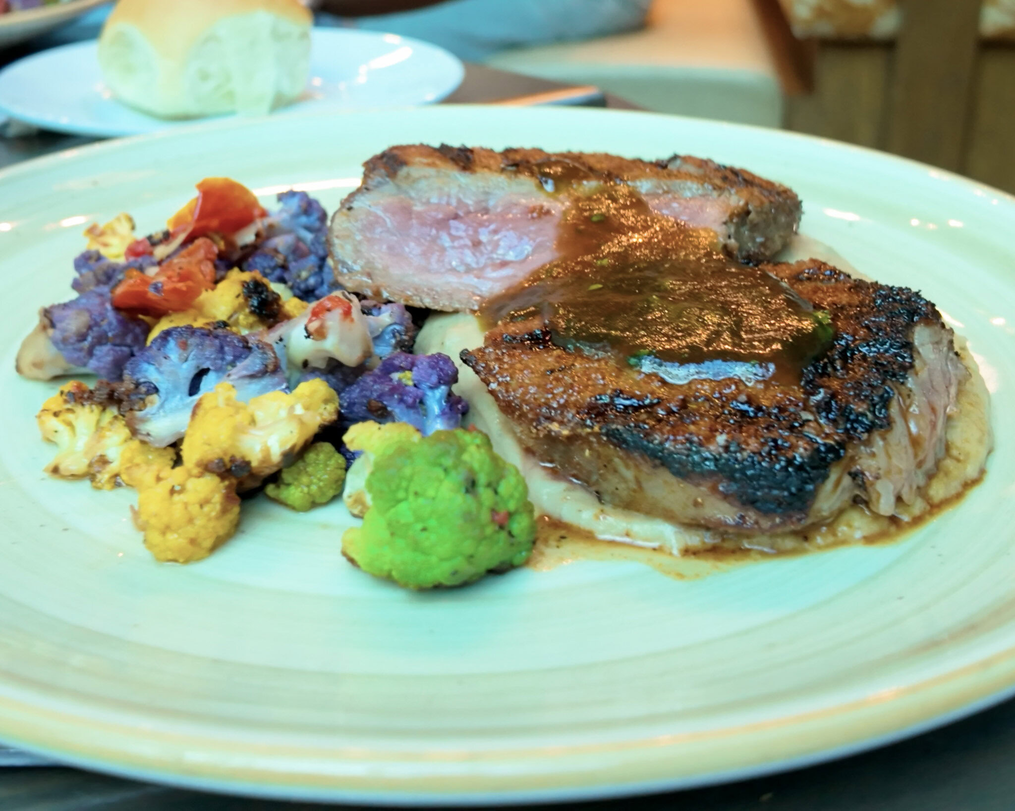 New York Strip steak with mashed potatoes and vegetables at Kona Caf&eacute; in Disney&rsquo;s Polynesian Village Resort