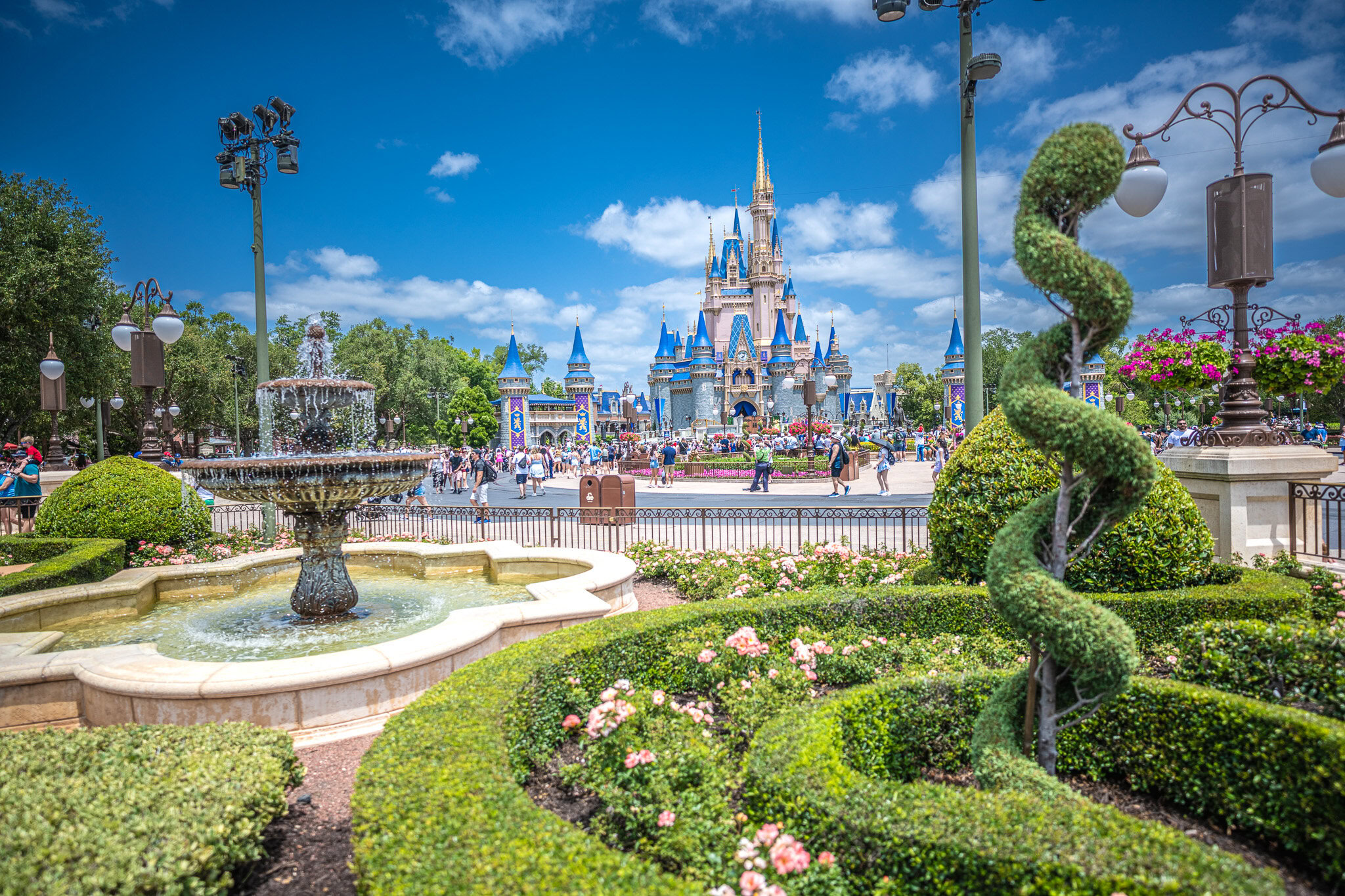 Cinderella Castle and Garden View at Magic Kingdom Cinderella Castle framed by gardens and a fountain in Magic Kingdom