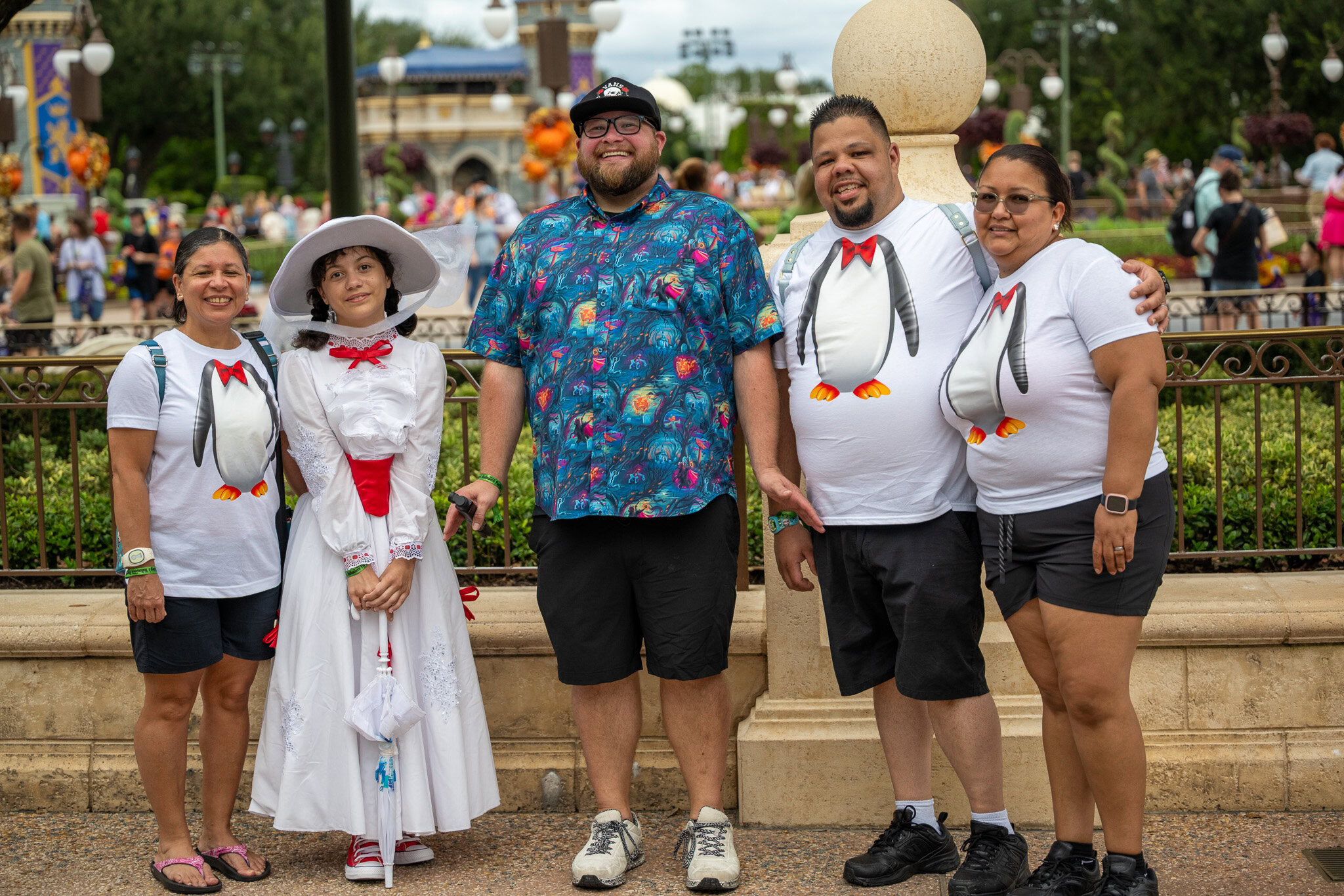 Family photo with Daniela dressed as Mary Poppins and Disney content creator Paging Mr. Morrow.