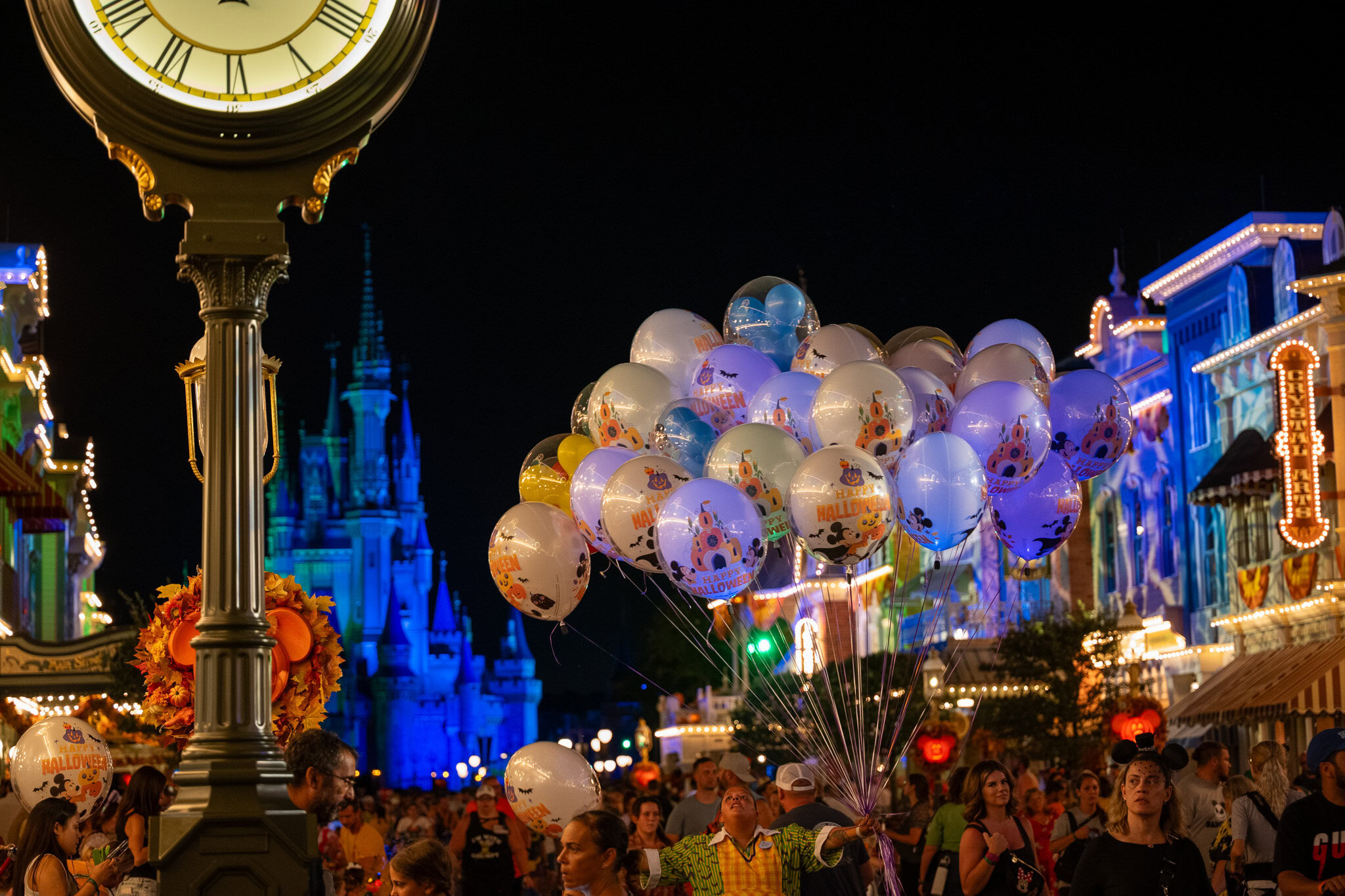 Main Street Halloween Balloons and Clock Tower Clock tower and Halloween balloons on Main Street U.S.A. at night