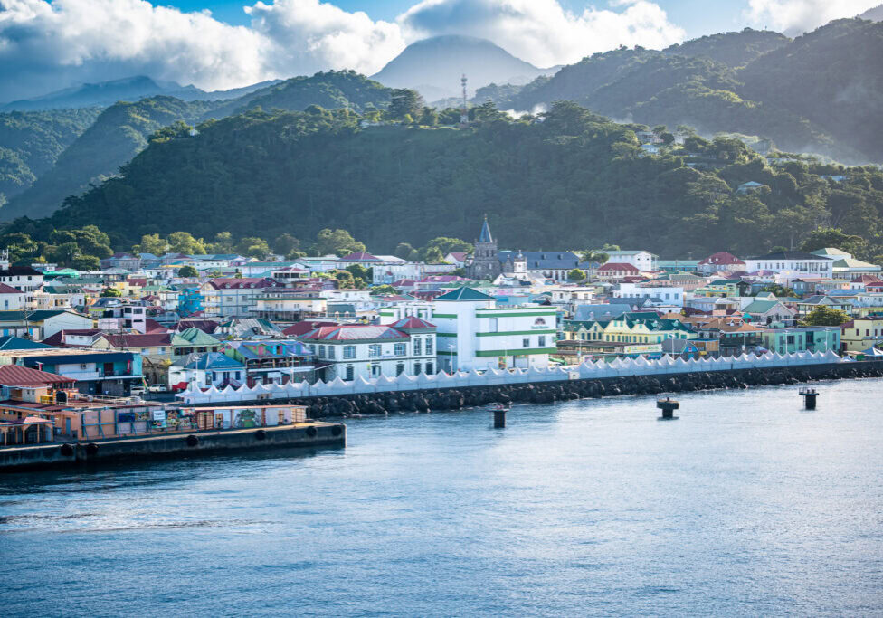 Colorful buildings and mountains seen from the Dominica cruise port